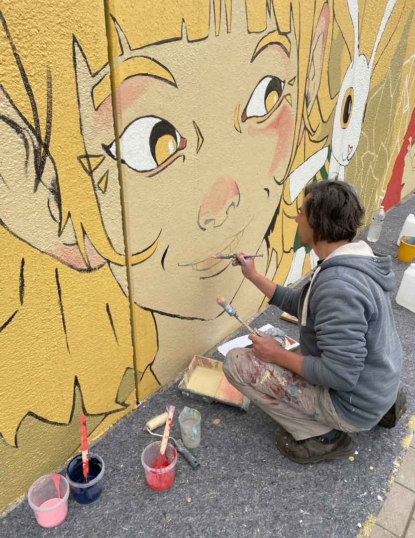 Bart Behiels aan het werk als muralist